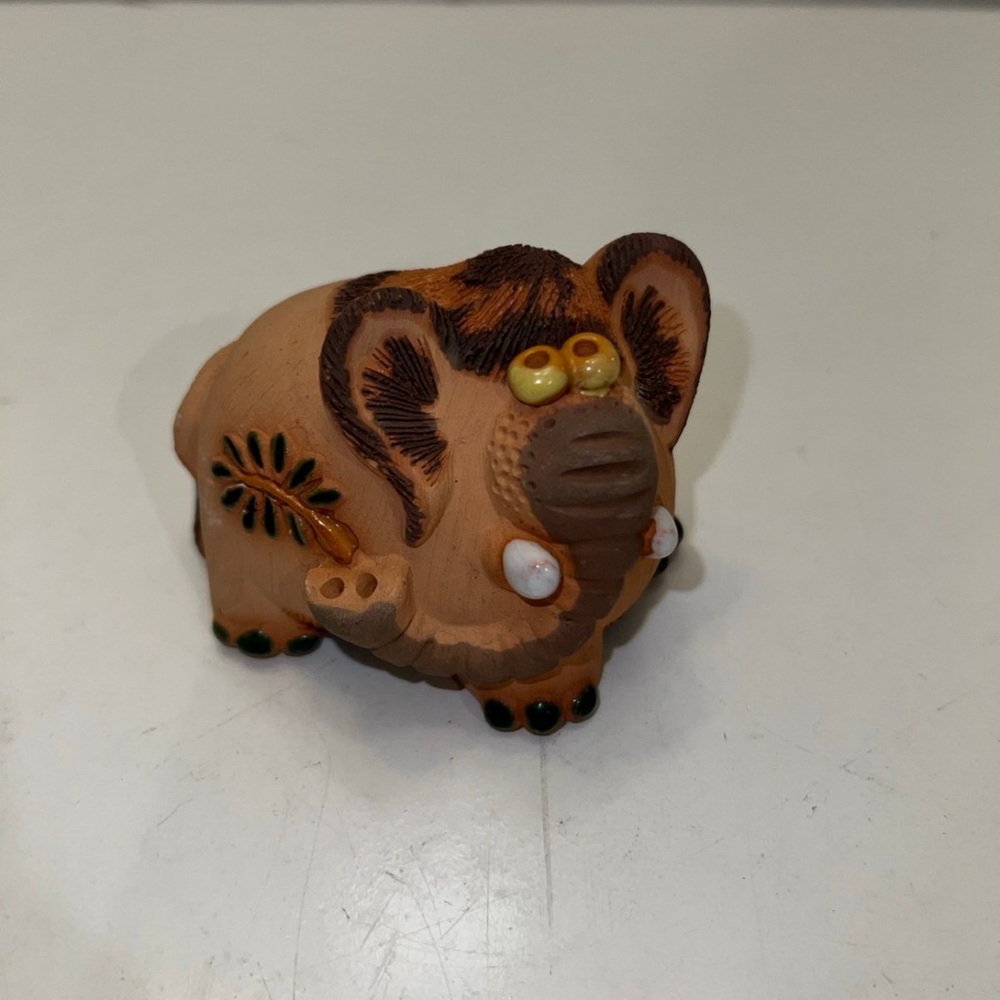 Handmade clay baby mammoth